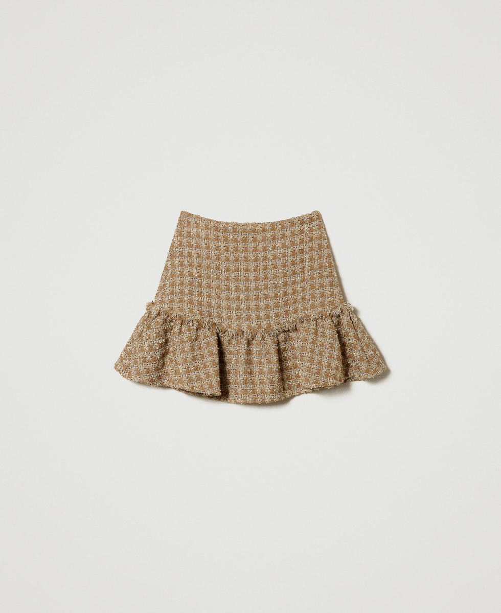 Mini-jupe en tissu boucl&eacute; avec fil lurex