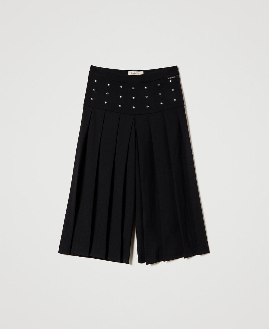 Trouser-skirt with studs