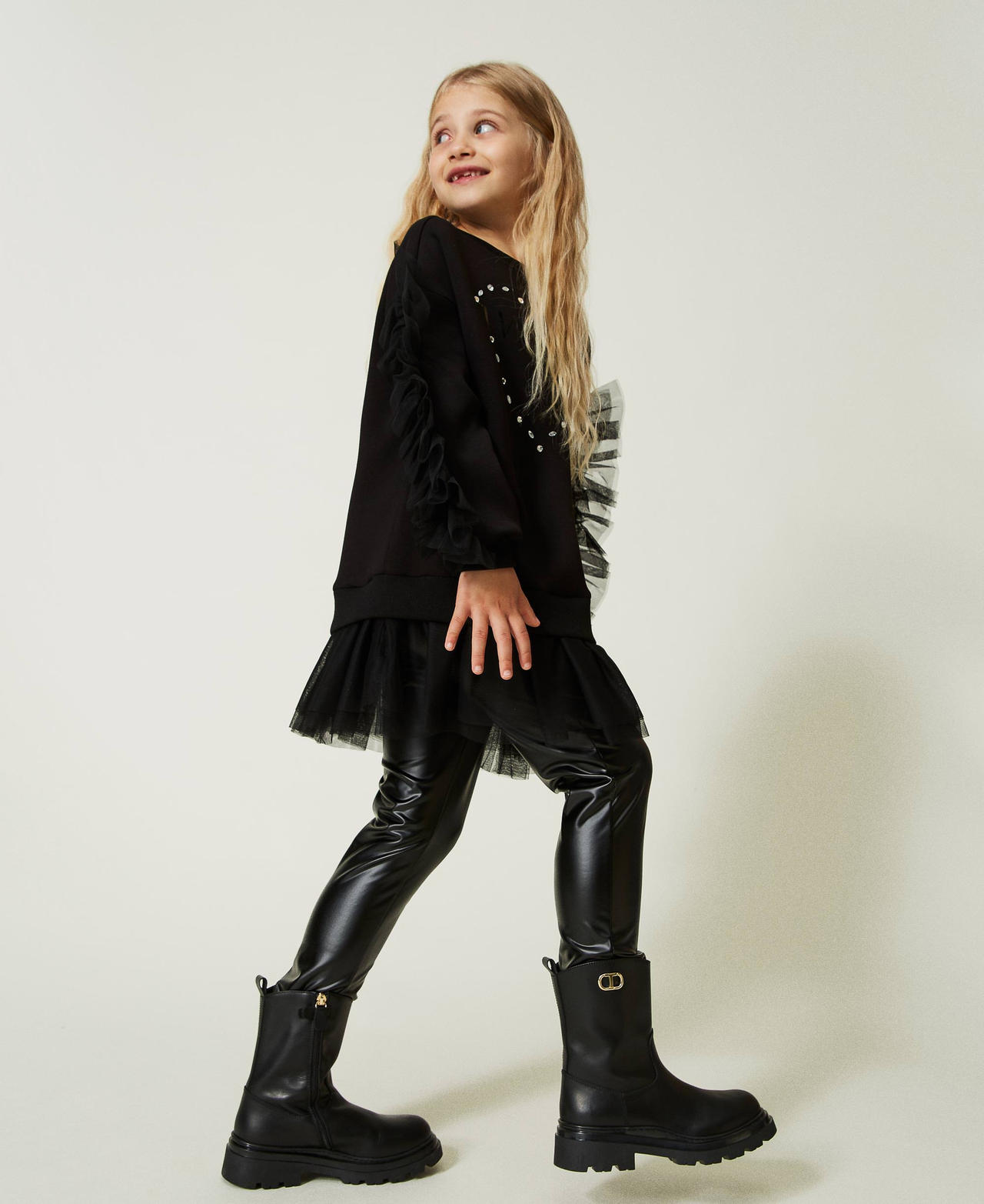 Maxi sweatshirt with ruffles and leather-like leggings