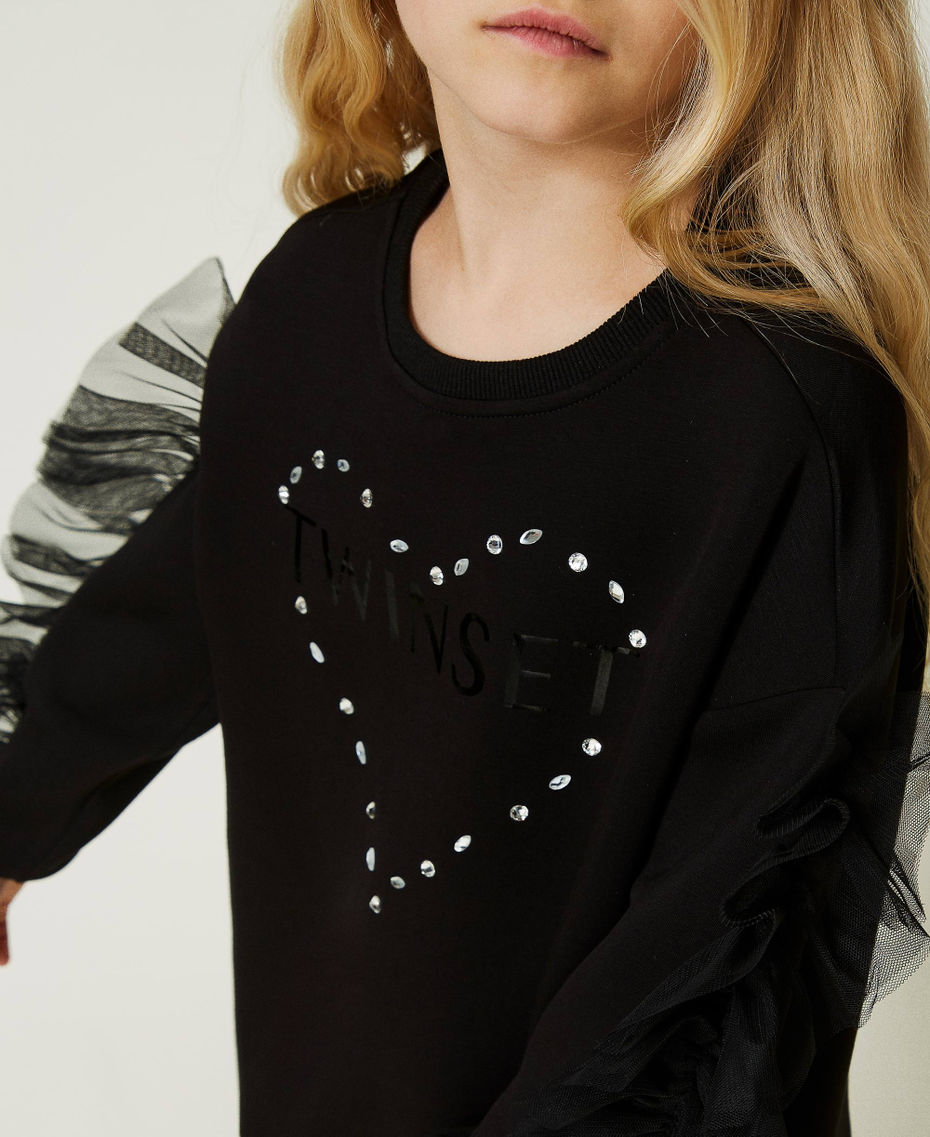 Maxi sweatshirt with ruffles and leather-like leggings