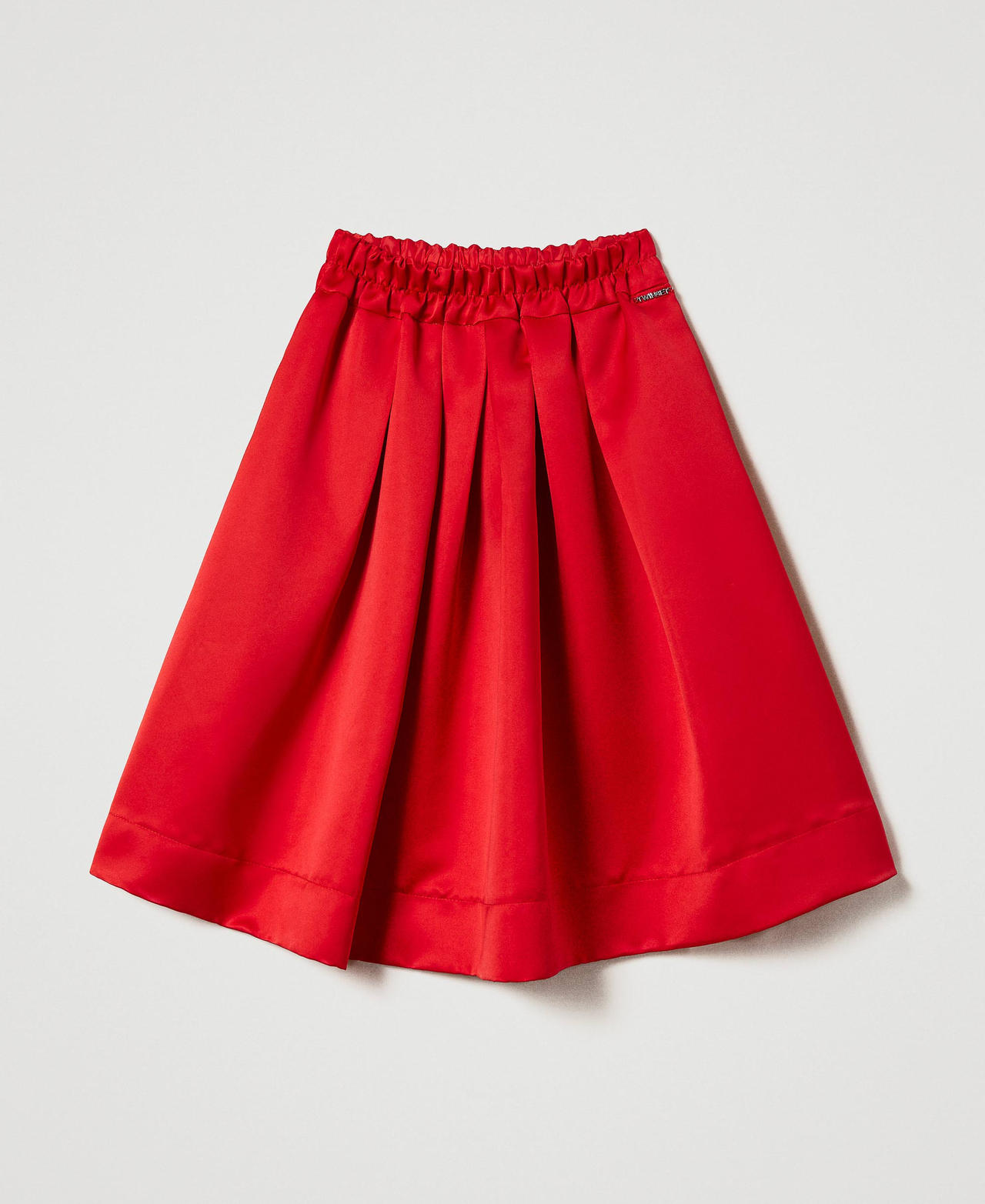 Jupe en satin duchesse avec plis