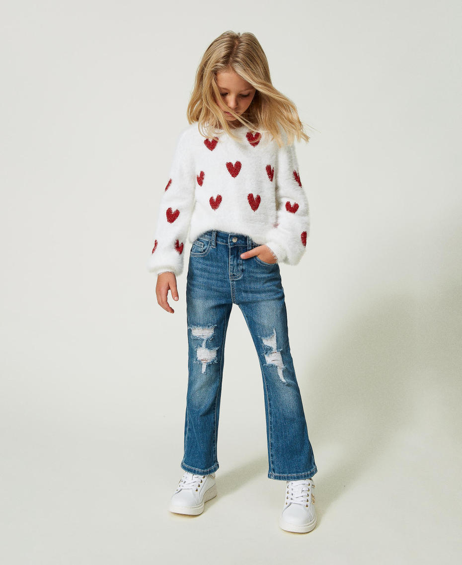 Flared jeans with rips