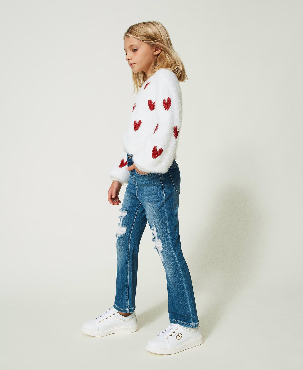 Flared jeans with rips