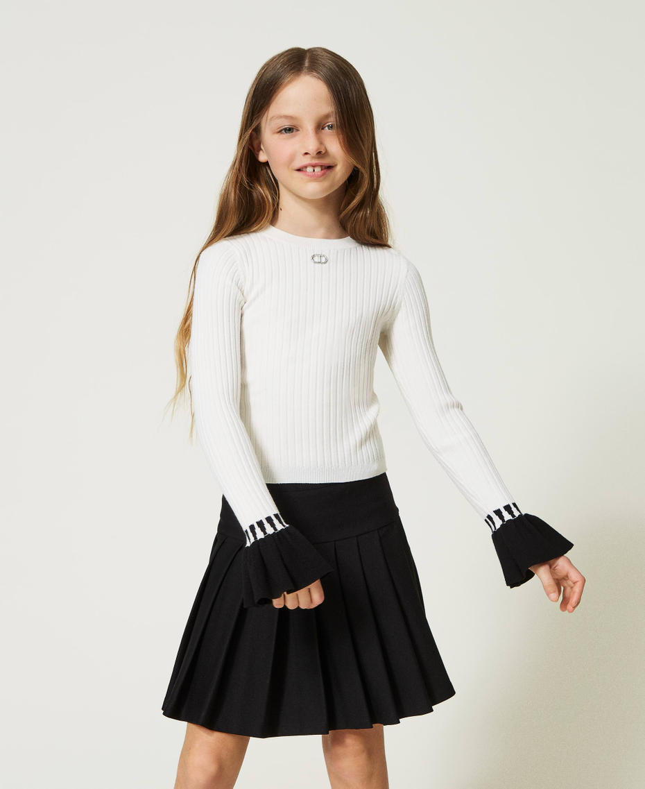 Ribbed jumper with flounces