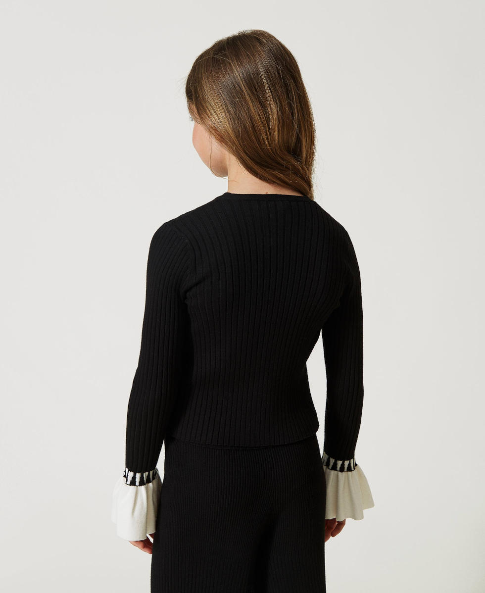 Cardigan e top a costine