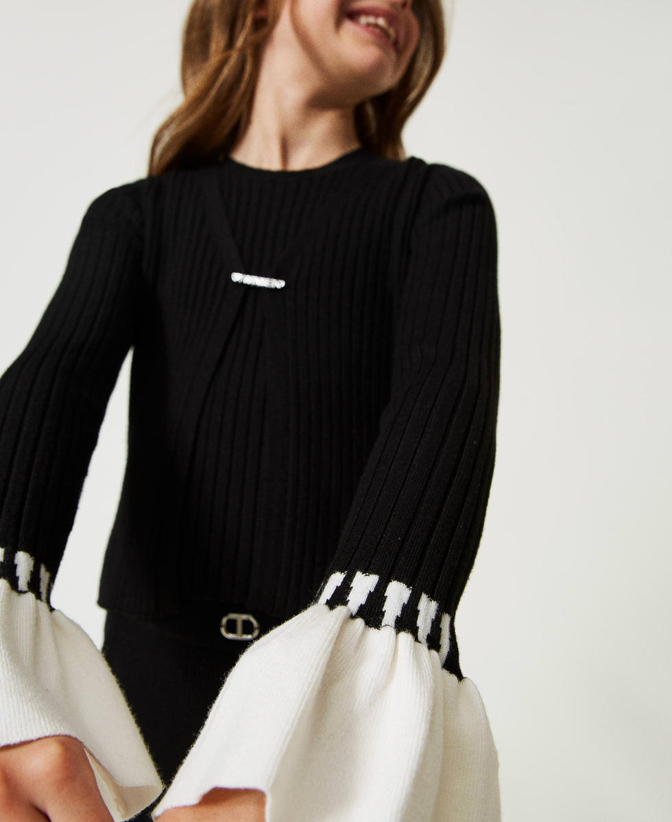 Cardigan e top a costine