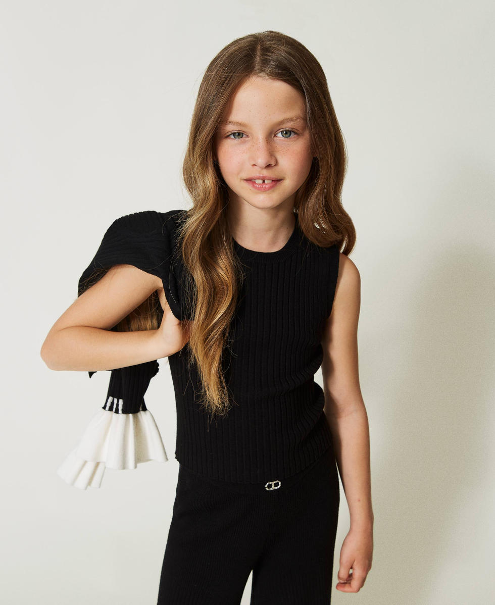 Cardigan e top a costine