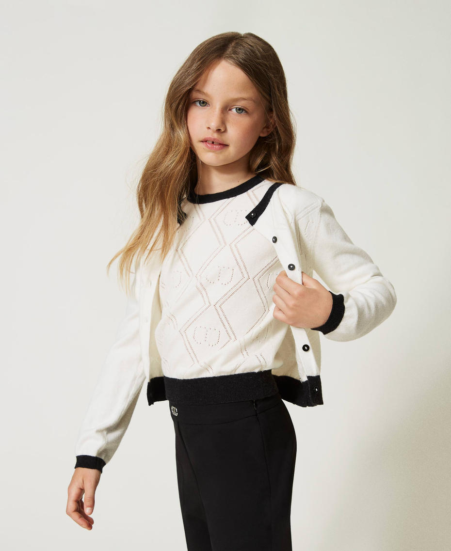 Cardigan et pull avec motif Oval T