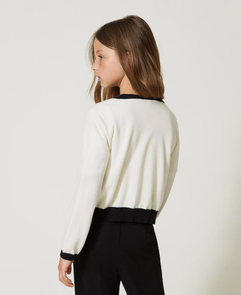 Cardigan et pull avec motif Oval T