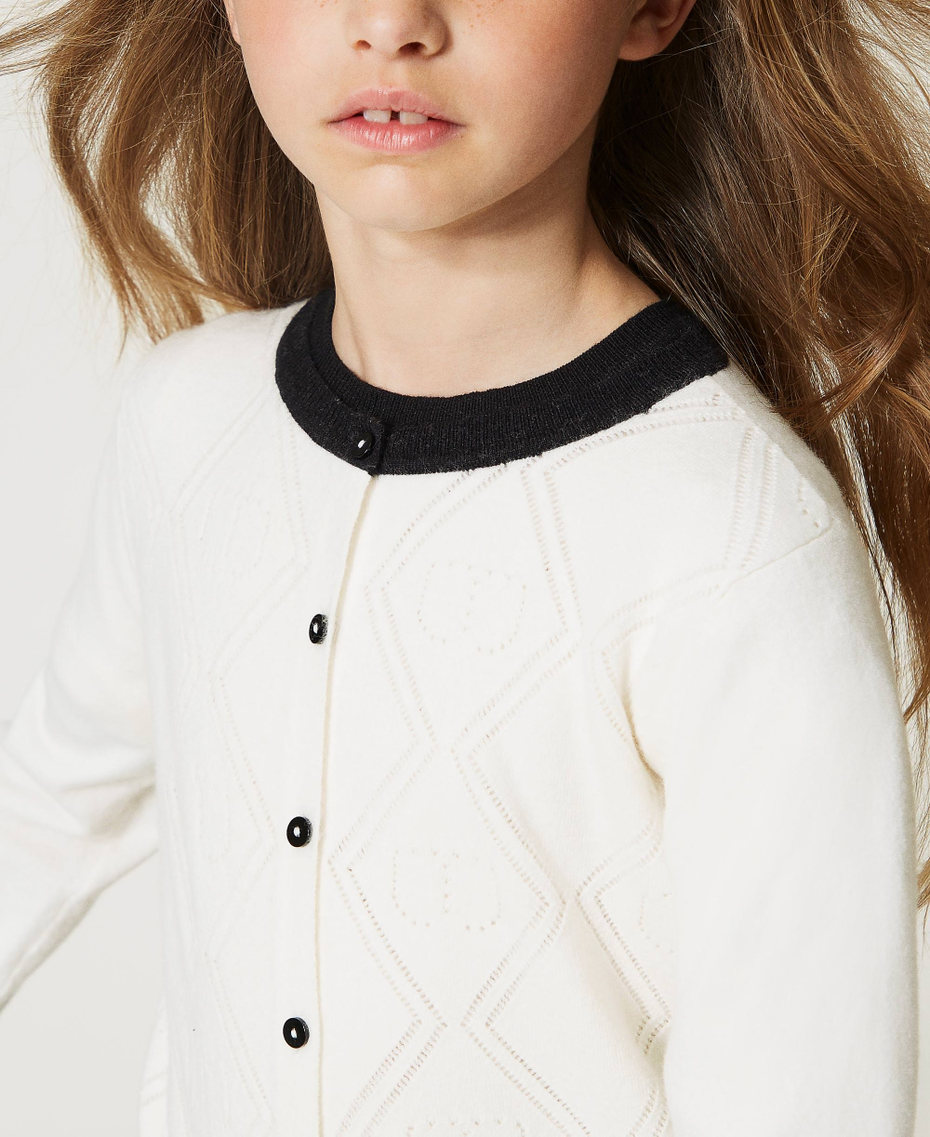 Cardigan et pull avec motif Oval T