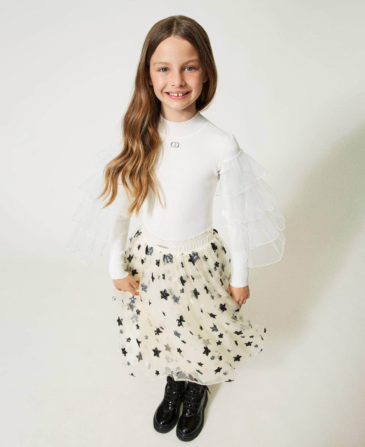 Pull col montant avec volants en tulle