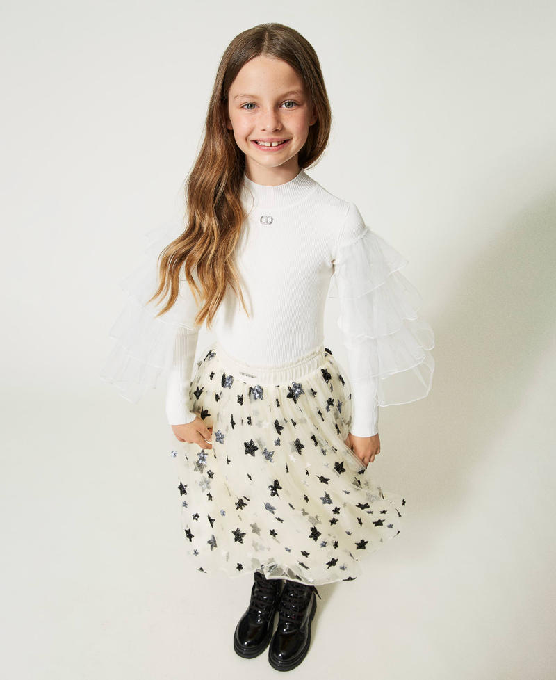 Pull col montant avec volants en tulle