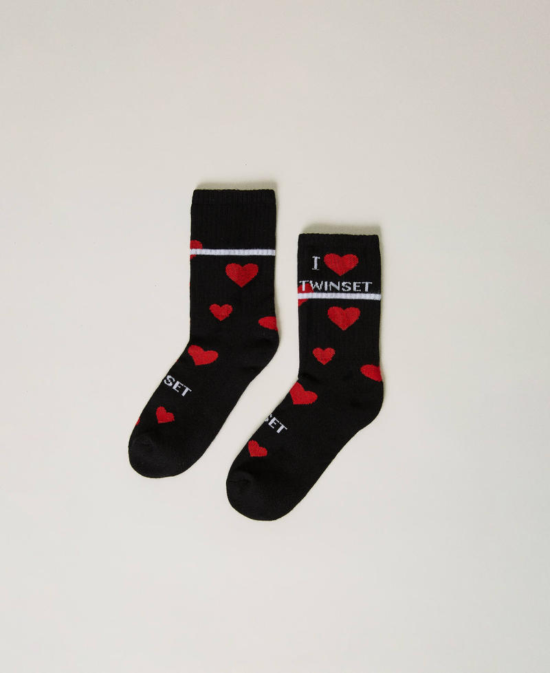 Long socks with jacquard hearts Black Girl 232GJ4381-01