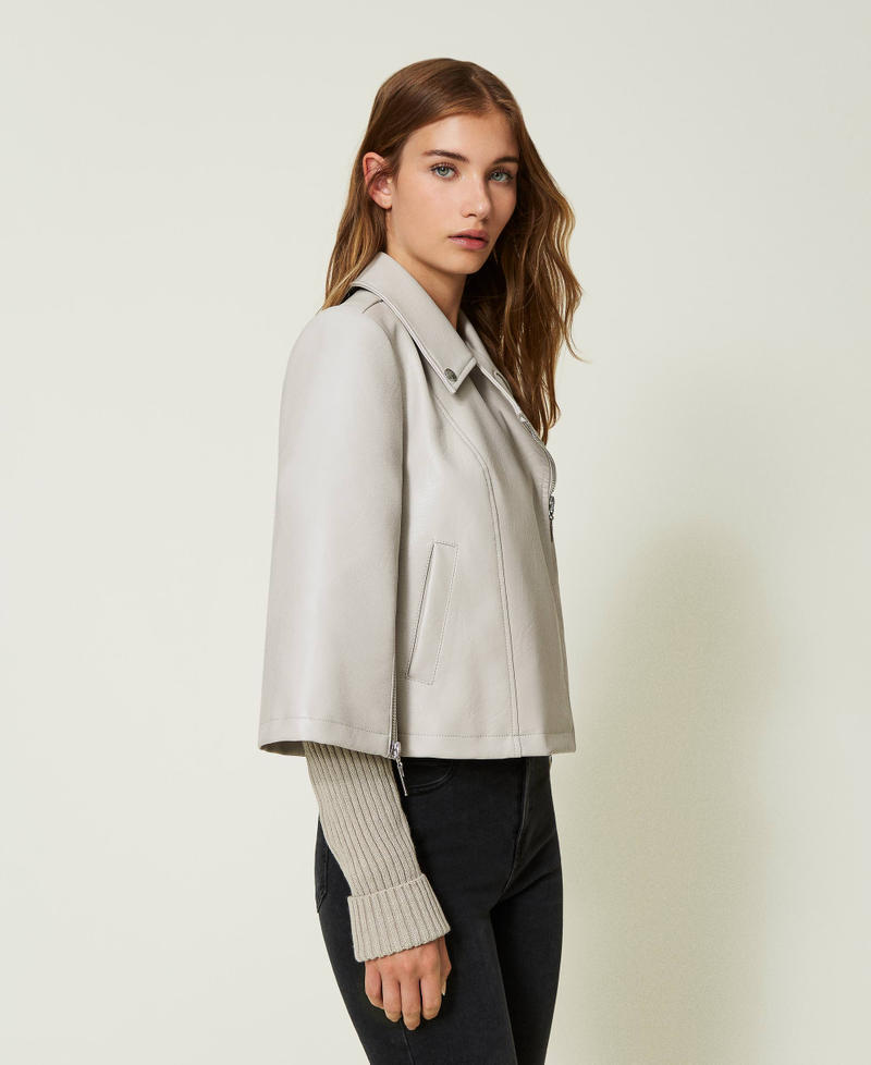 Biker jacket with knit sleeves