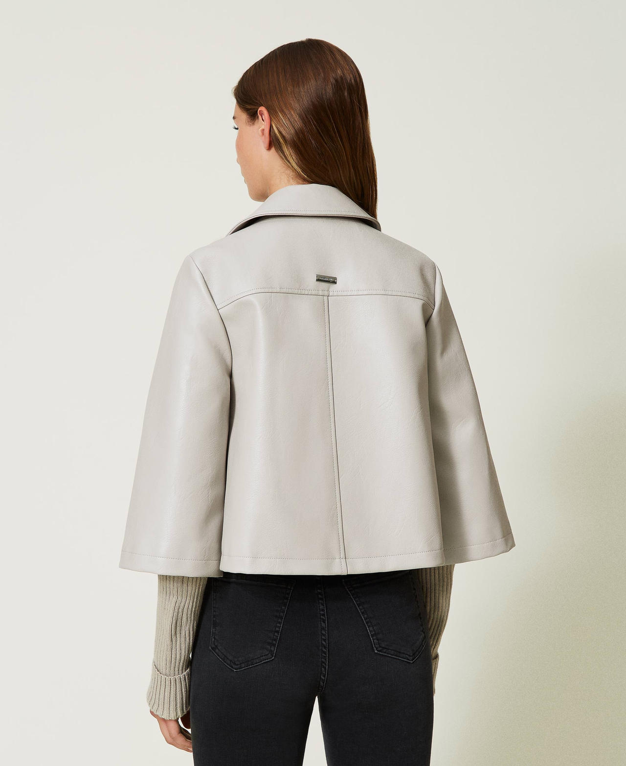 Biker jacket with knit sleeves