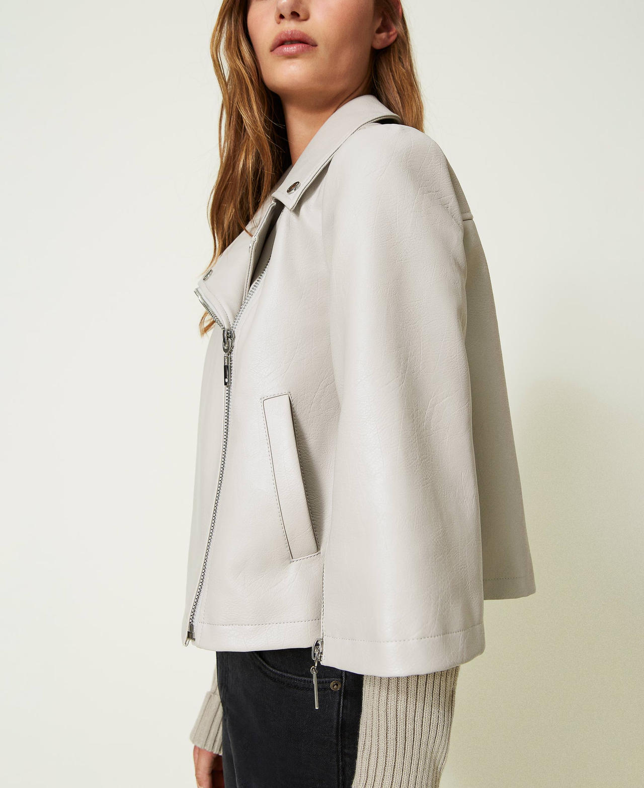 Leather jacket hotsell with knit sleeves