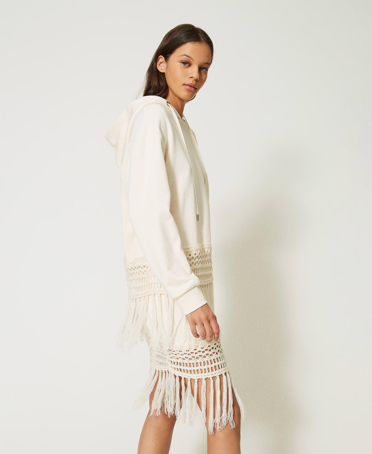 Hoodie with embroidered trim and fringes