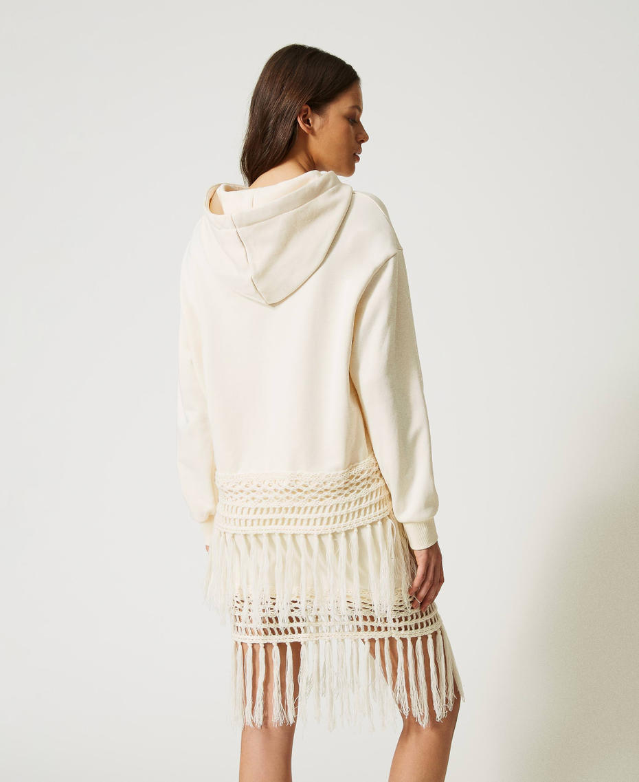 Hoodie with embroidered trim and fringes