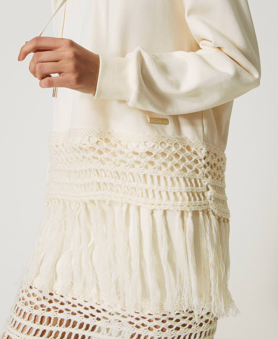 Hoodie with embroidered trim and fringes