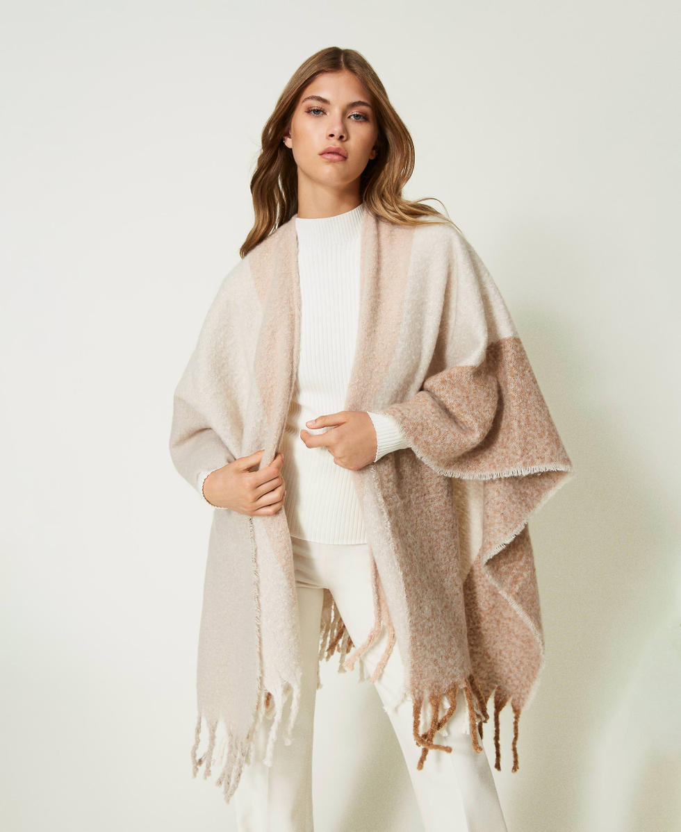 Poncho con frange hot sale