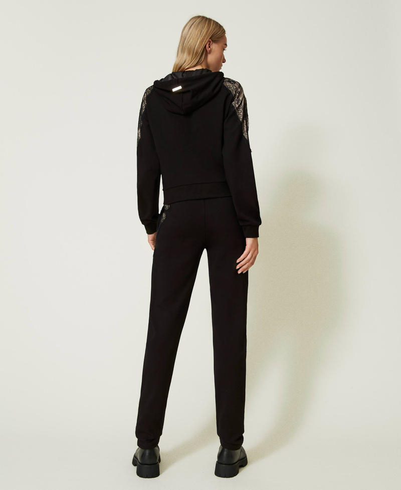 Hoodie and trousers with lace Black Woman 232LL2CPP-03
