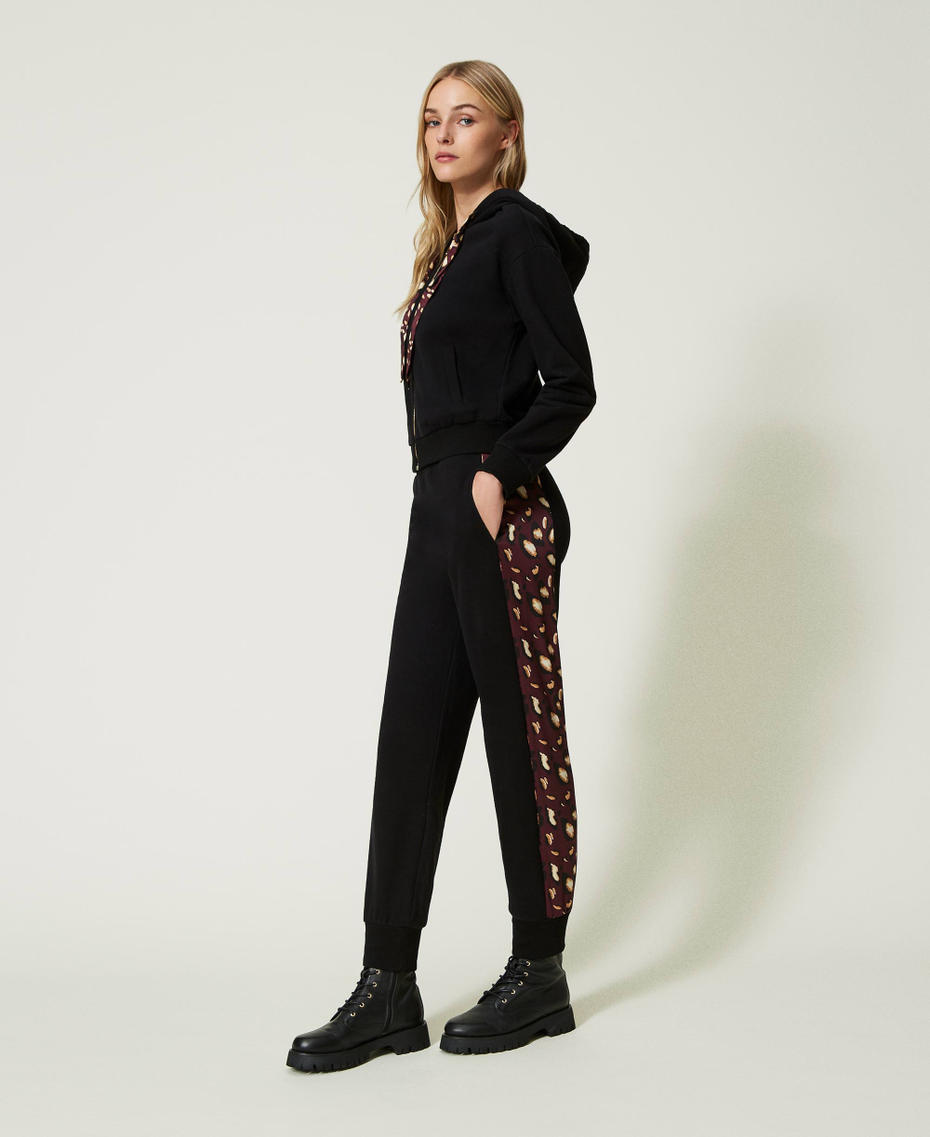 Hoodie and joggers with animal print details Two-tone Black / “Ruby Wine” Purple Leo Print Woman 232LL2QBB-01