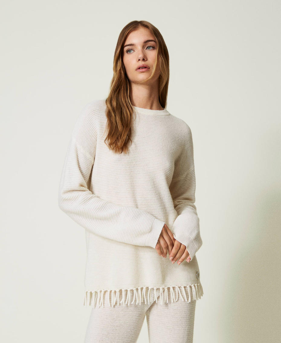 Wool jumper with fringes