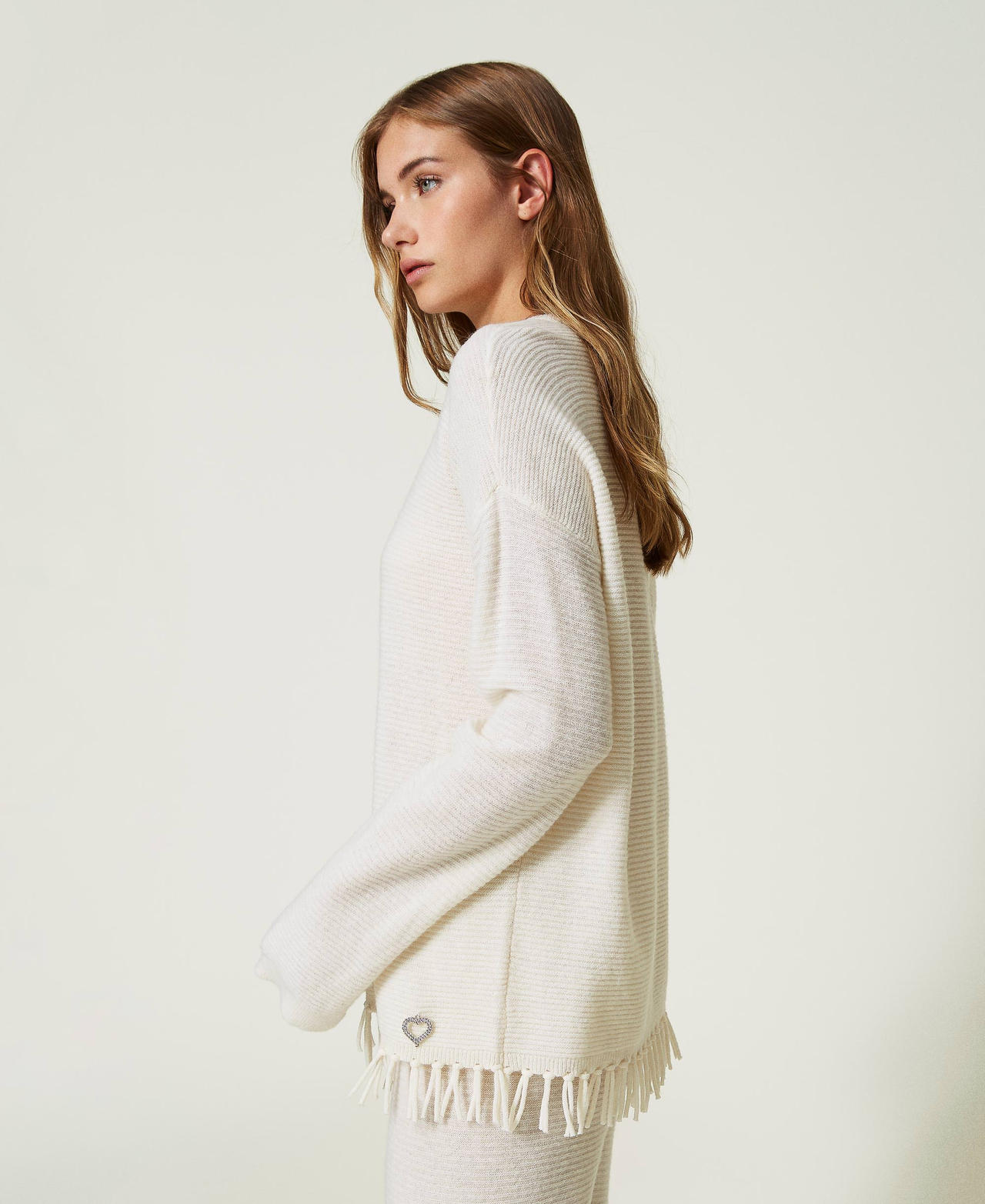 Wool jumper with fringes