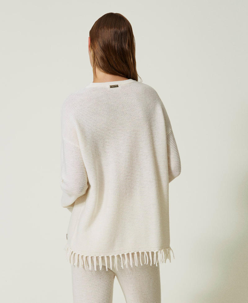 Wool jumper with fringes