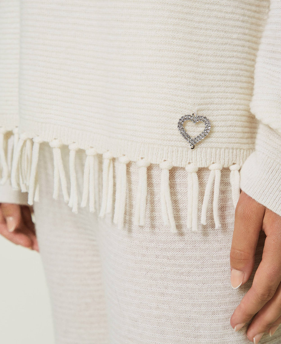 Wool jumper with fringes