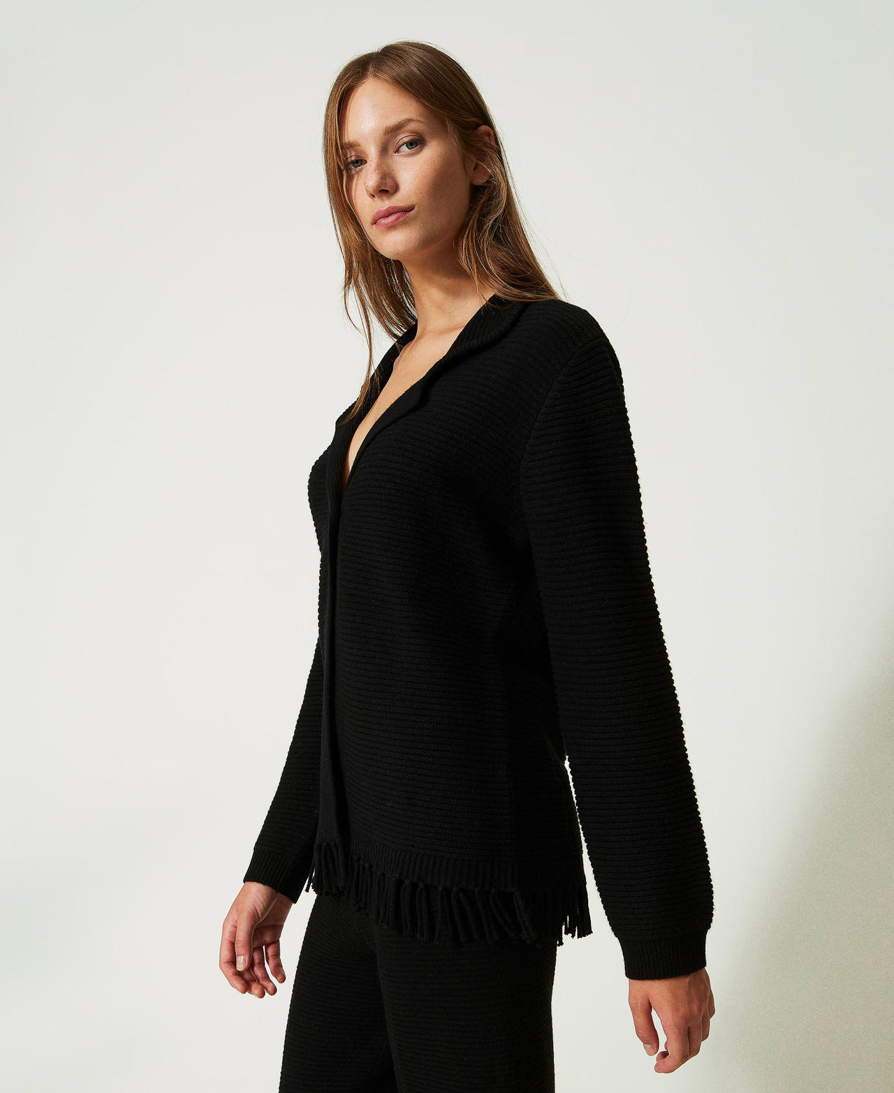 Wool cardigan with fringes