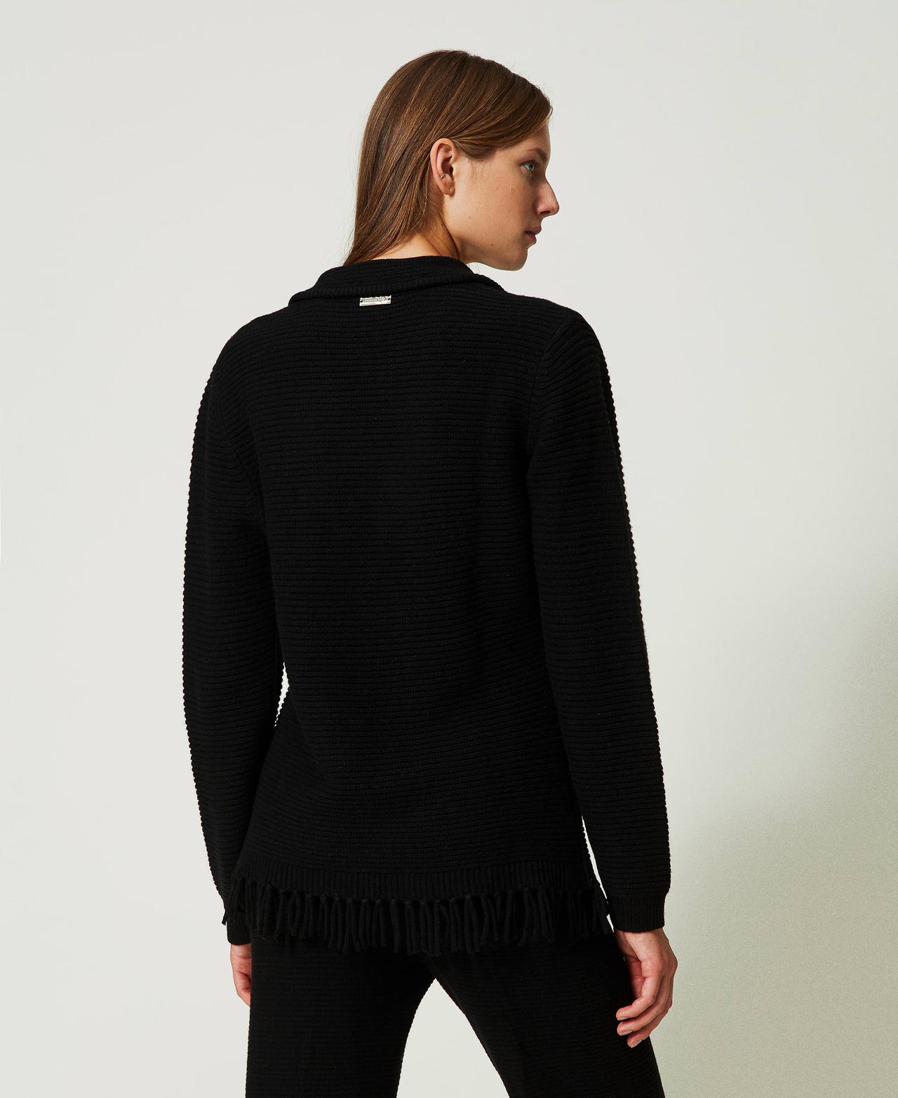 Wool cardigan with fringes