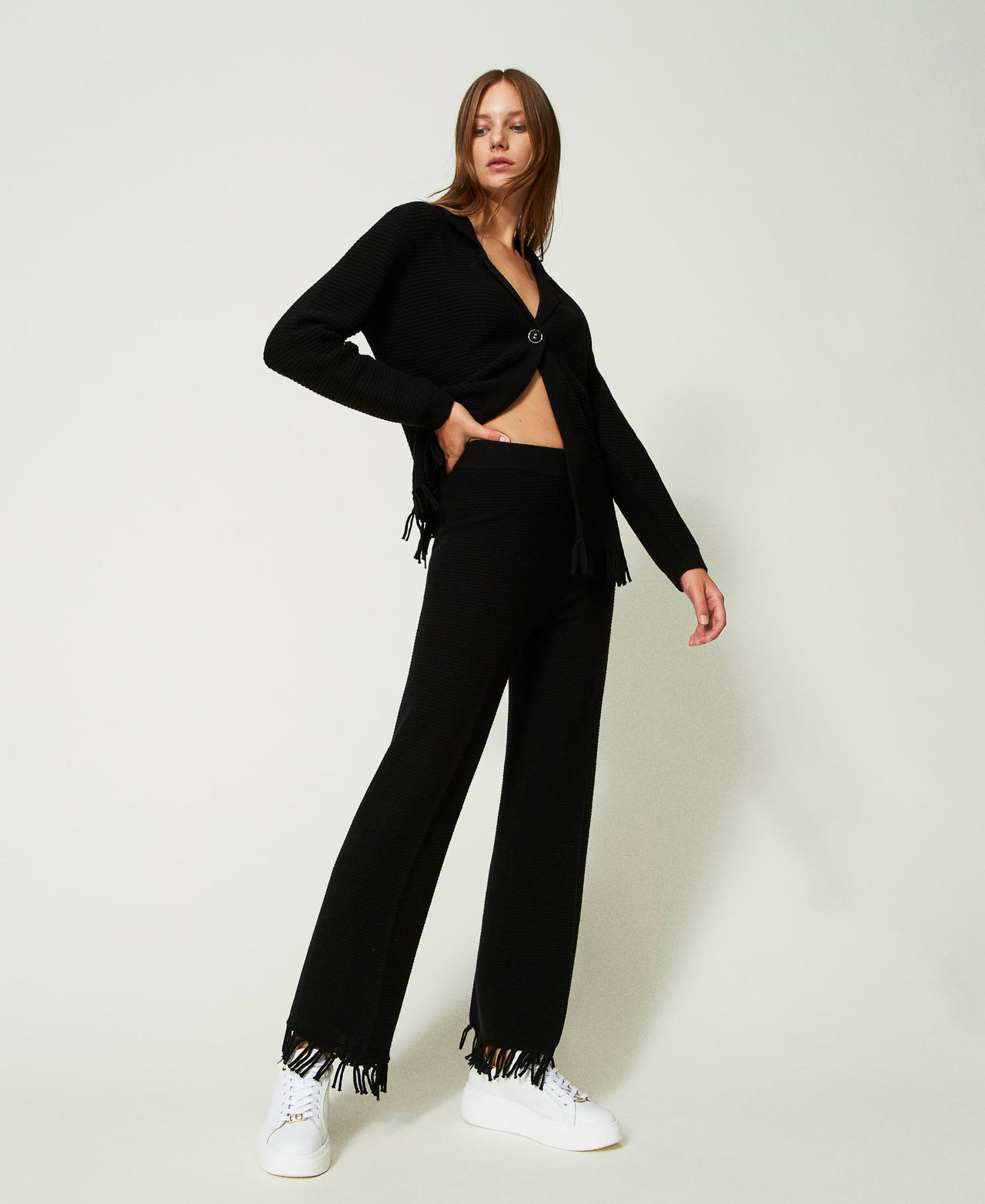 Pantaloni con frange in fondo discount
