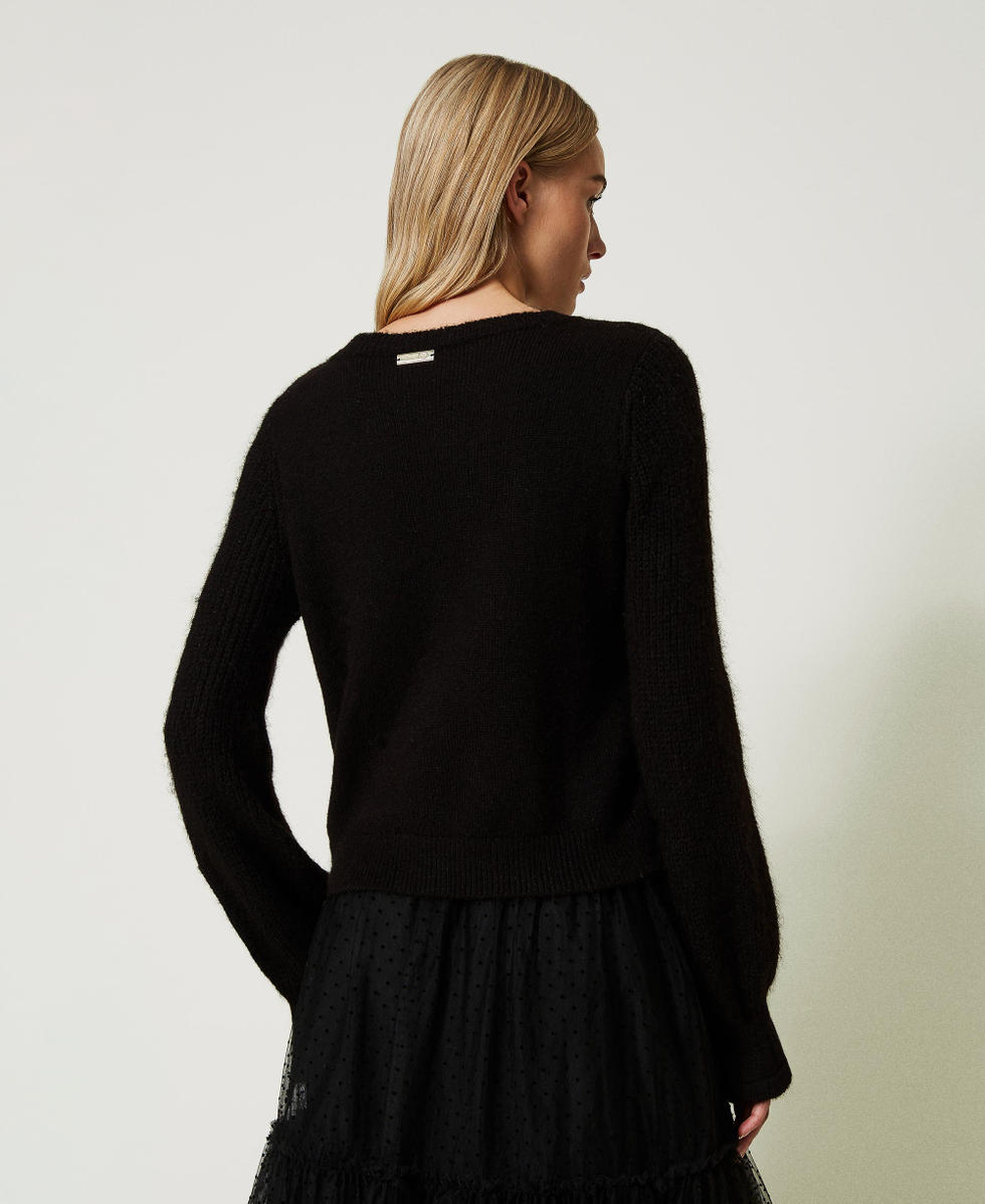 Pull en laine m&eacute;lang&eacute;e avec perles