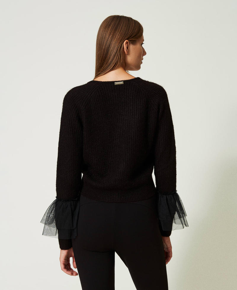 Cardigan with tulle ruffles