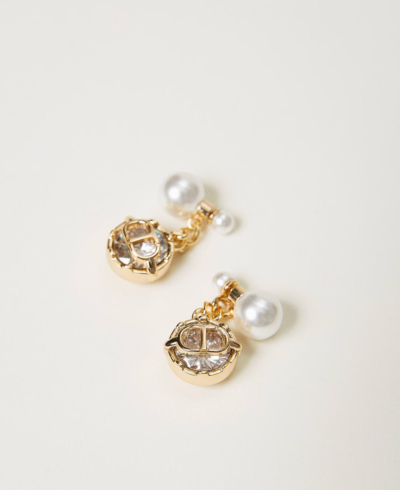 Boucles d’oreilles avec perle, strass et Oval T