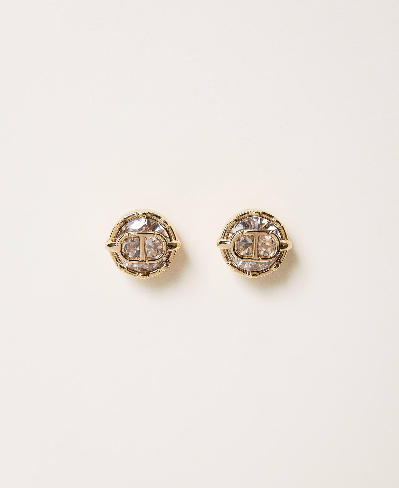 Earrings with rhinestones and Oval T