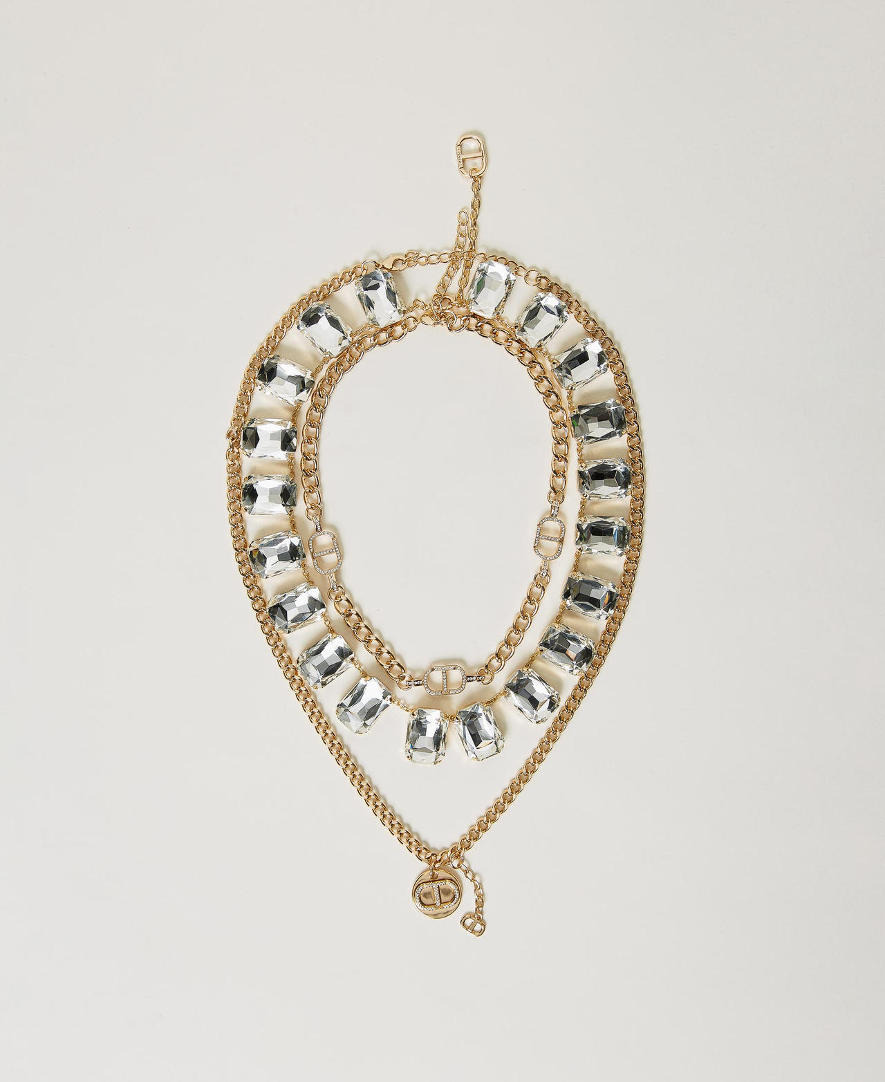 Set di collane con ciondolo Oval T e castoni