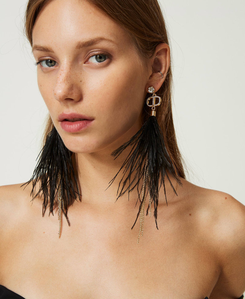 Orecchini con piume e frange