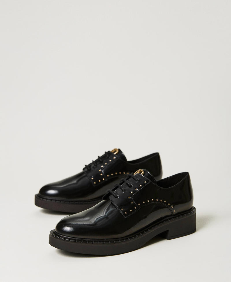 Tie-up shoes with studs