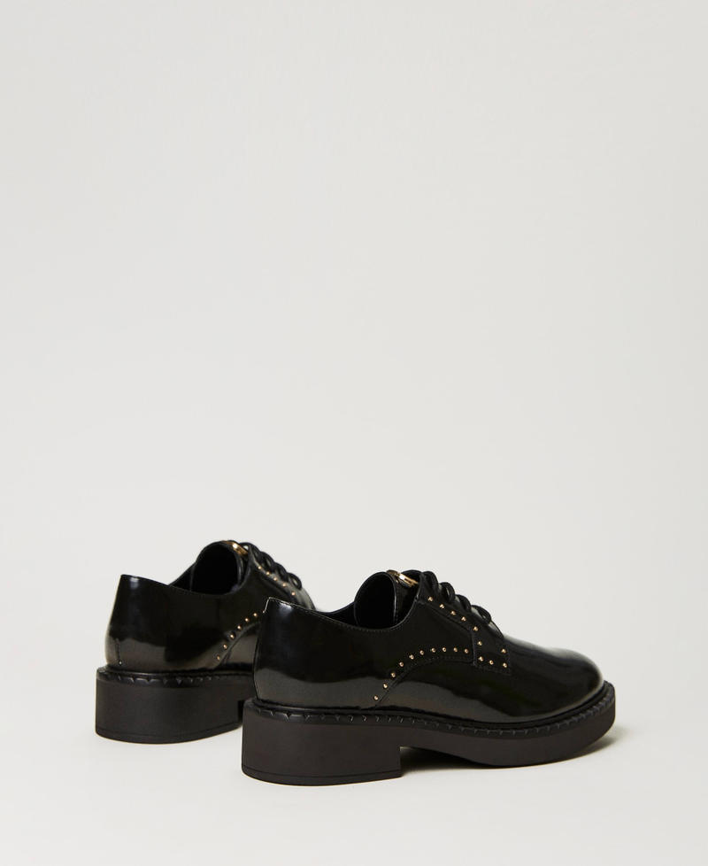 Tie-up shoes with studs