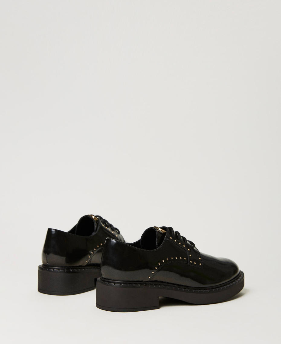 Tie-up shoes with studs