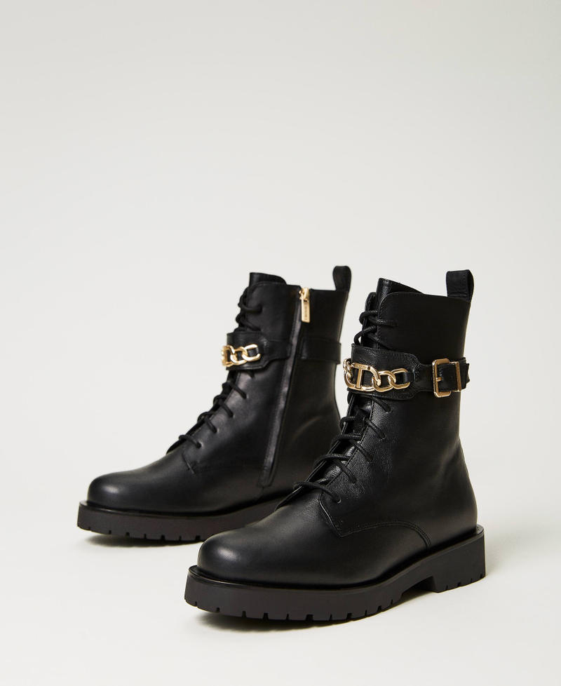 Bottines motardes en cuir avec chaîne Oval T