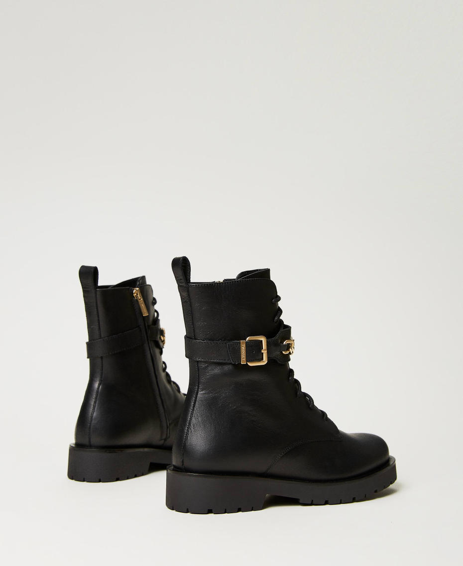 Bottines motardes en cuir avec chaîne Oval T