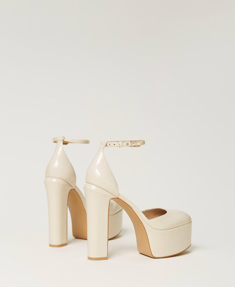 Patent leather platform court shoes