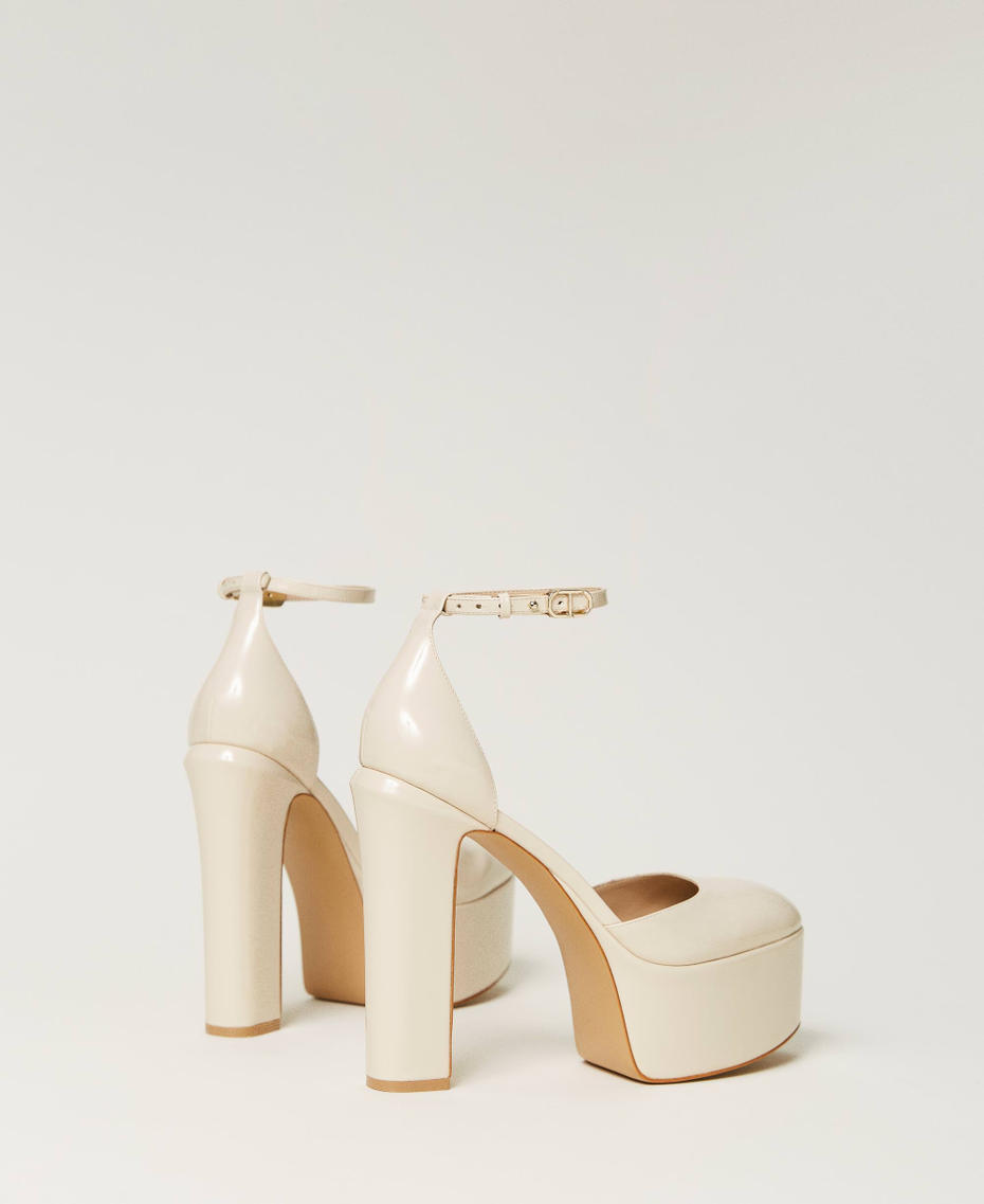 Patent leather platform court shoes