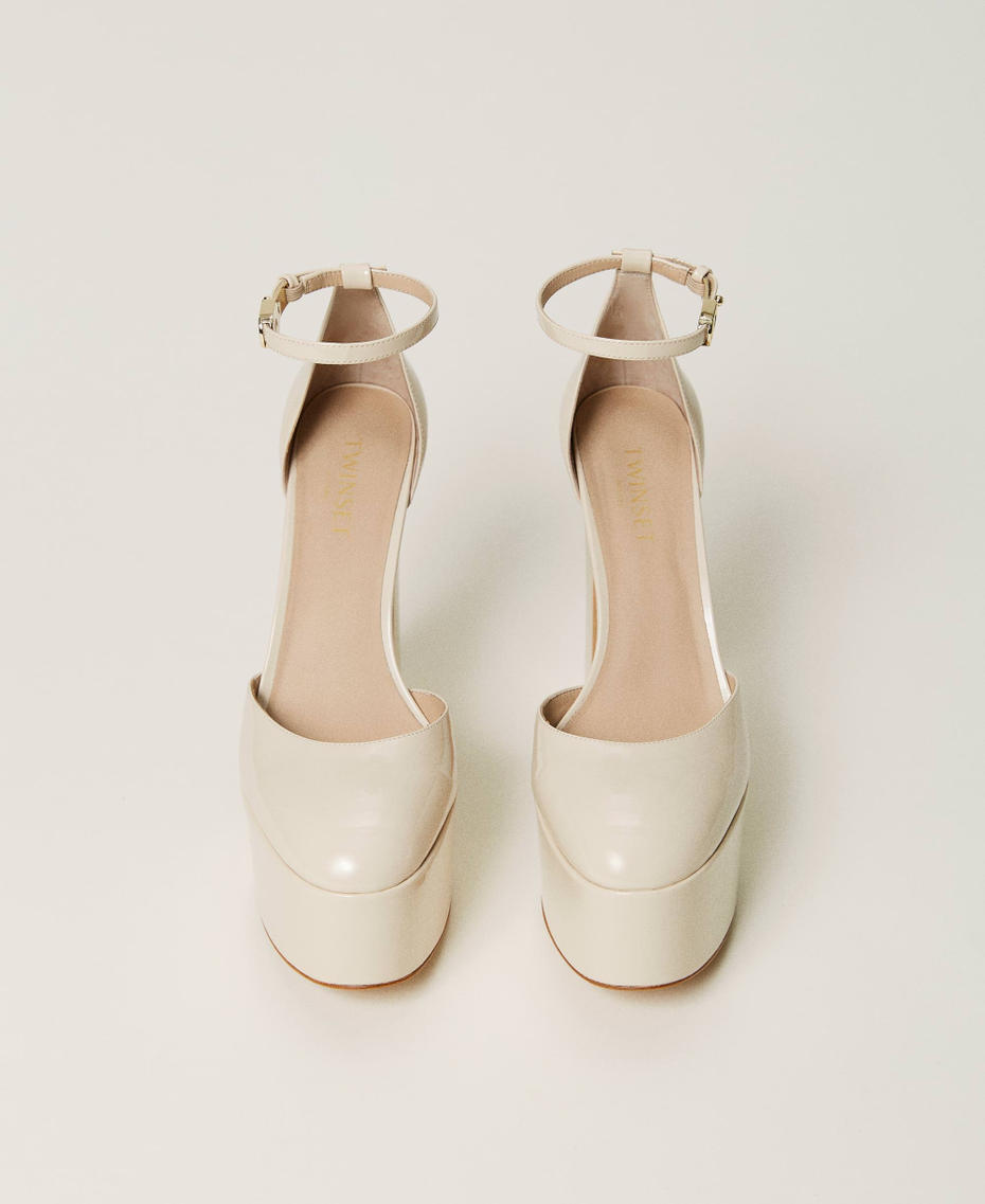 Patent leather platform court shoes