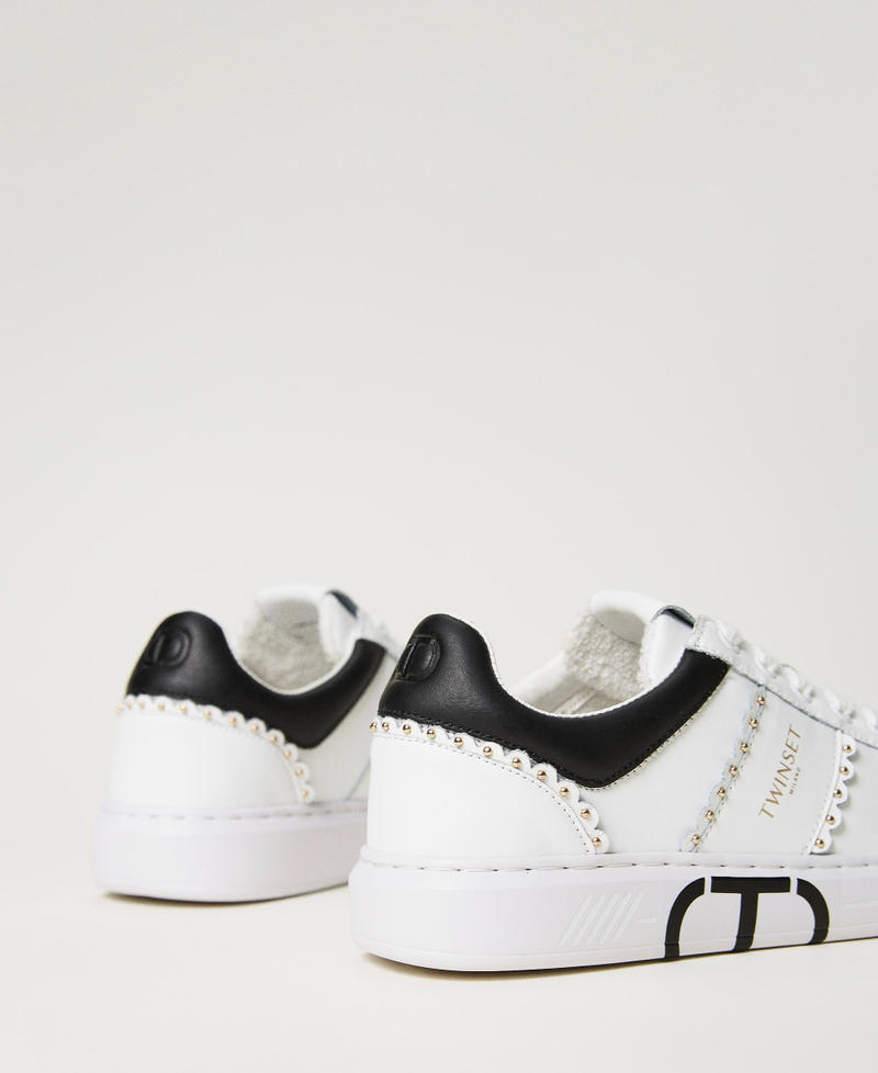 Leather trainers with studs and scalloping Bicolour Off White / Black Woman 232TCP220_02722_03