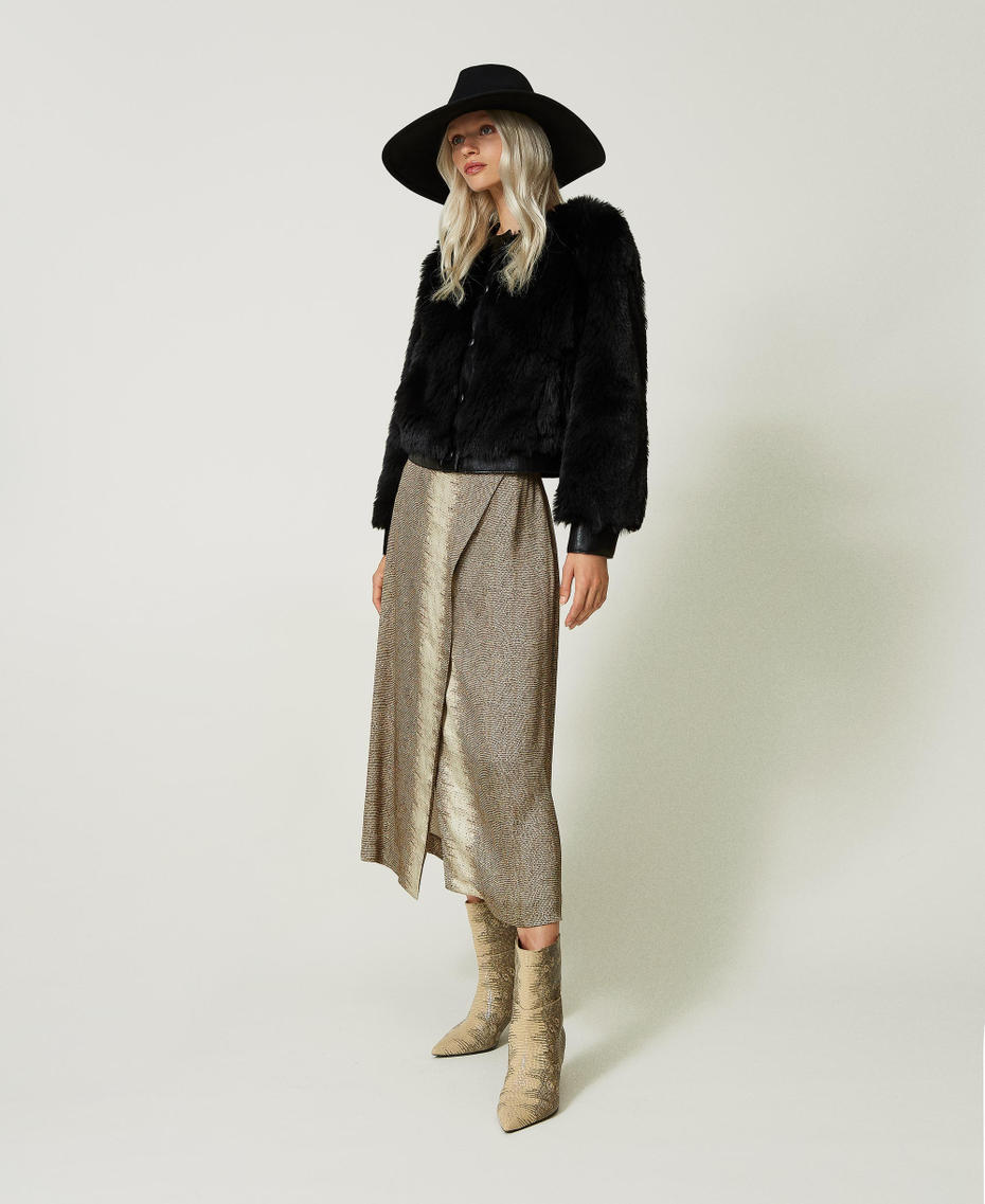 Leather ankle boots with lizard print