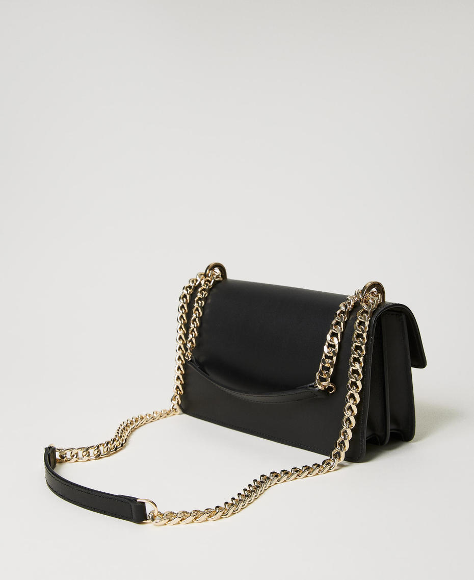 Borsa a tracolla con patta in pelle